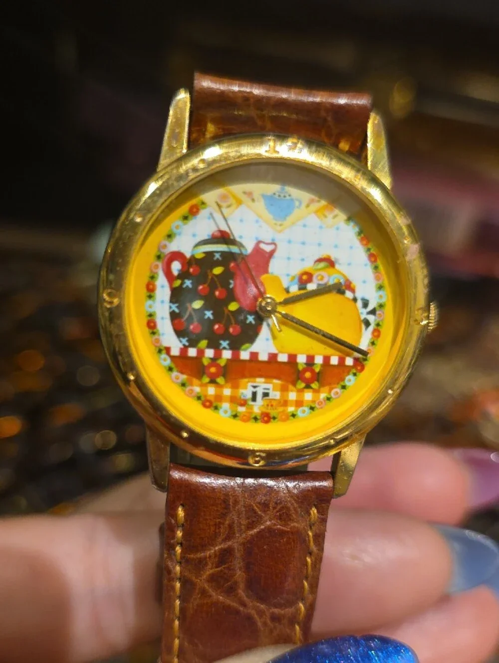 Vintage Gold-Tone Watch with Brown Leather Strap and Yellow Dial